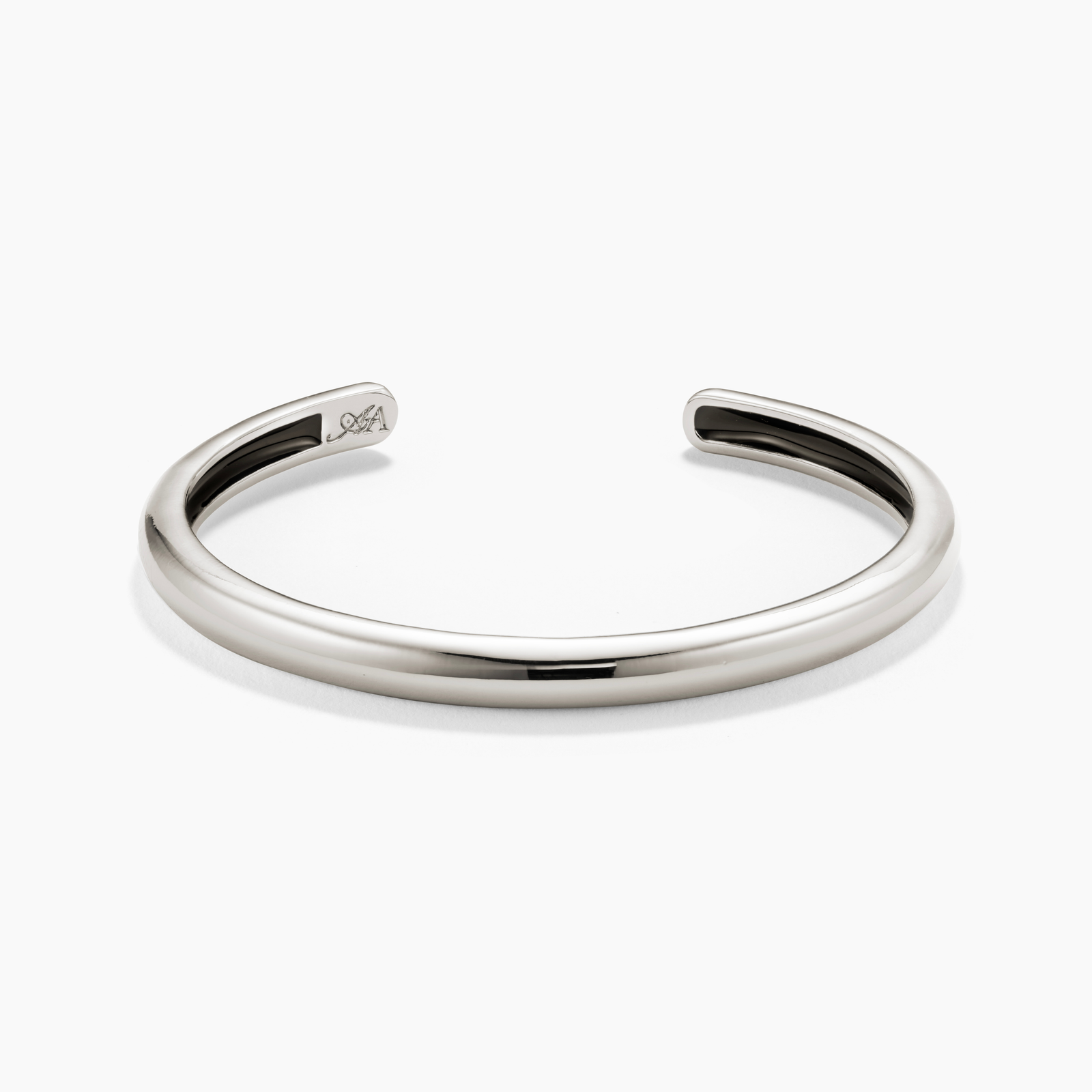 Silver bangle on a white background