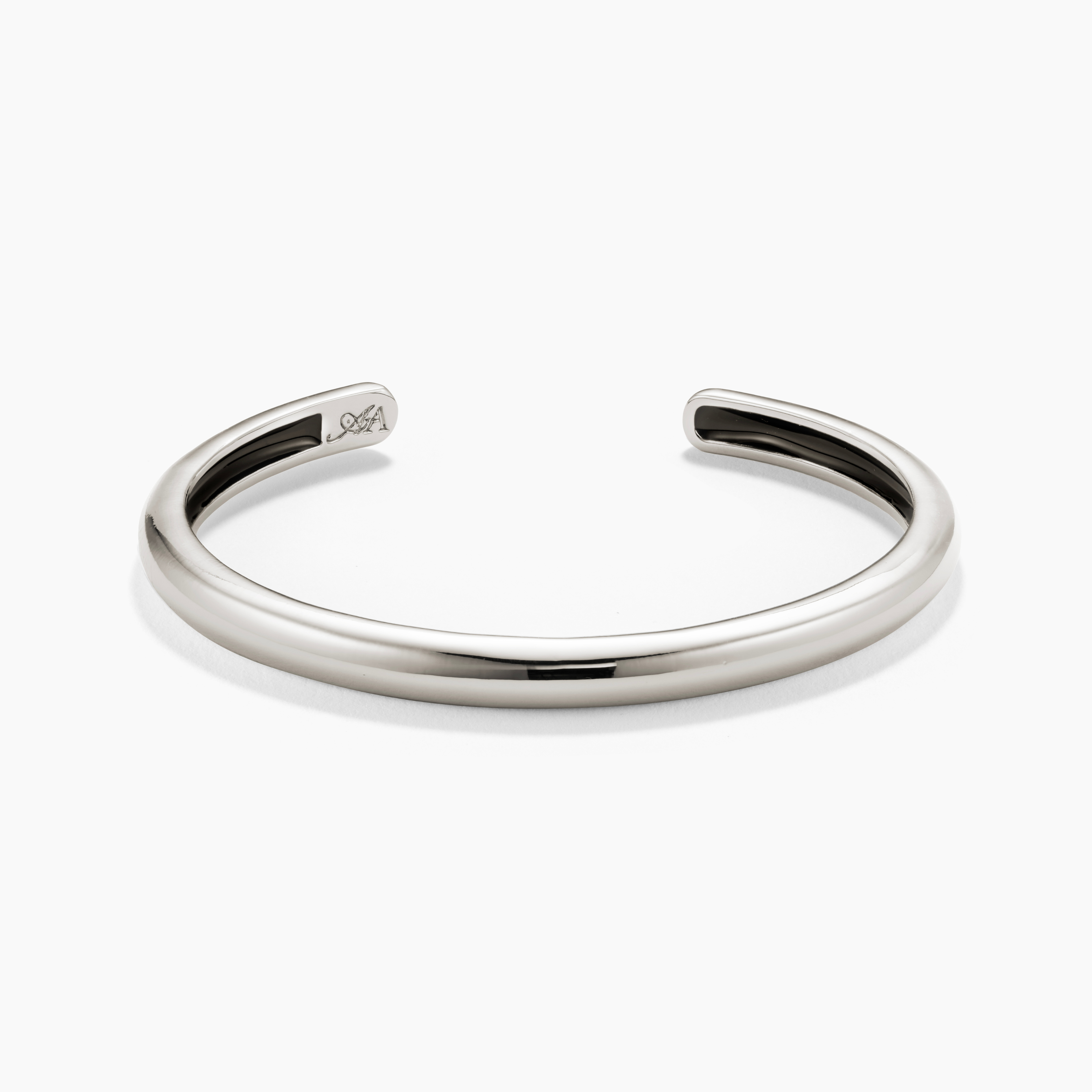 Silver bangle on a white background