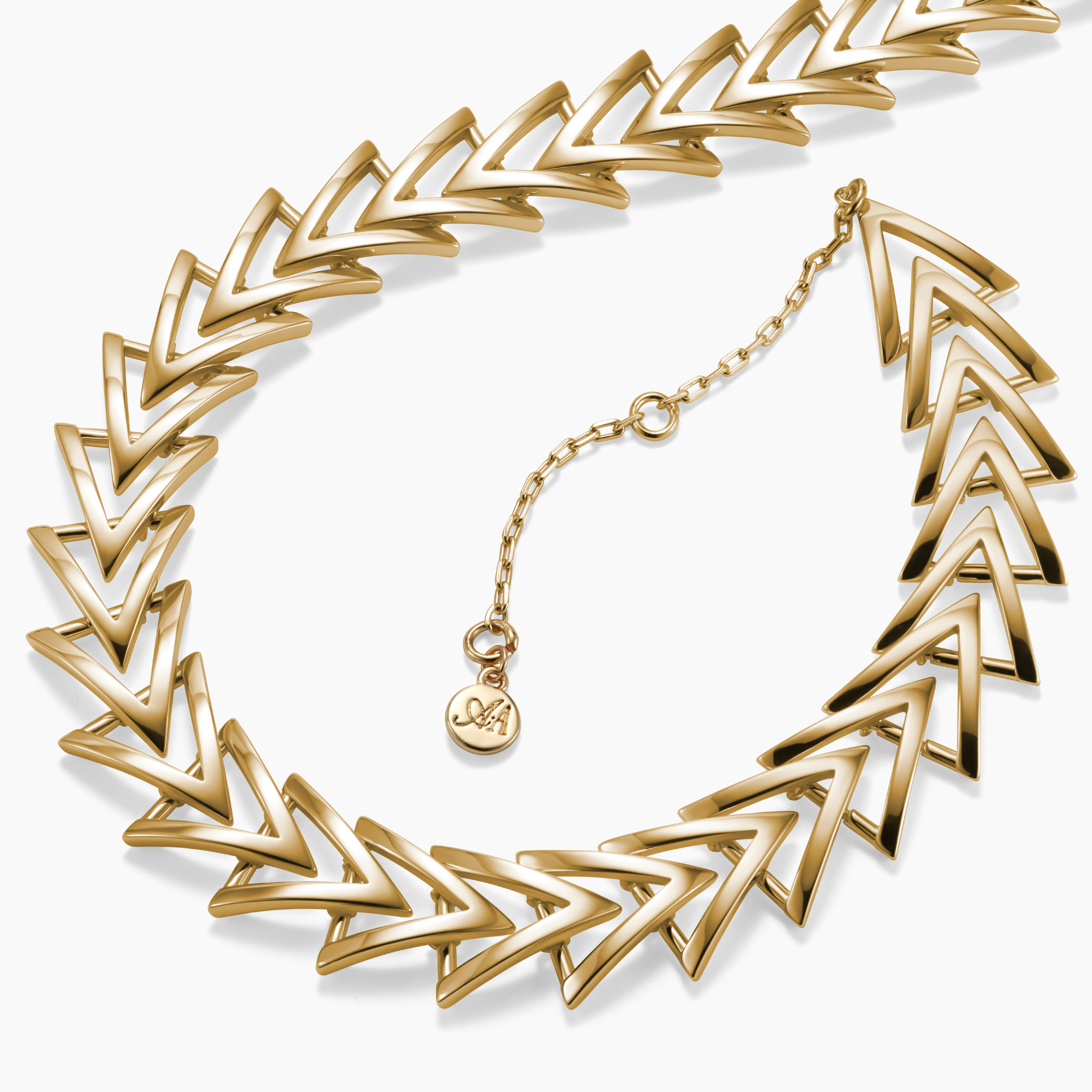 Armine + Ambrose A Chain chevron style necklace on a white background