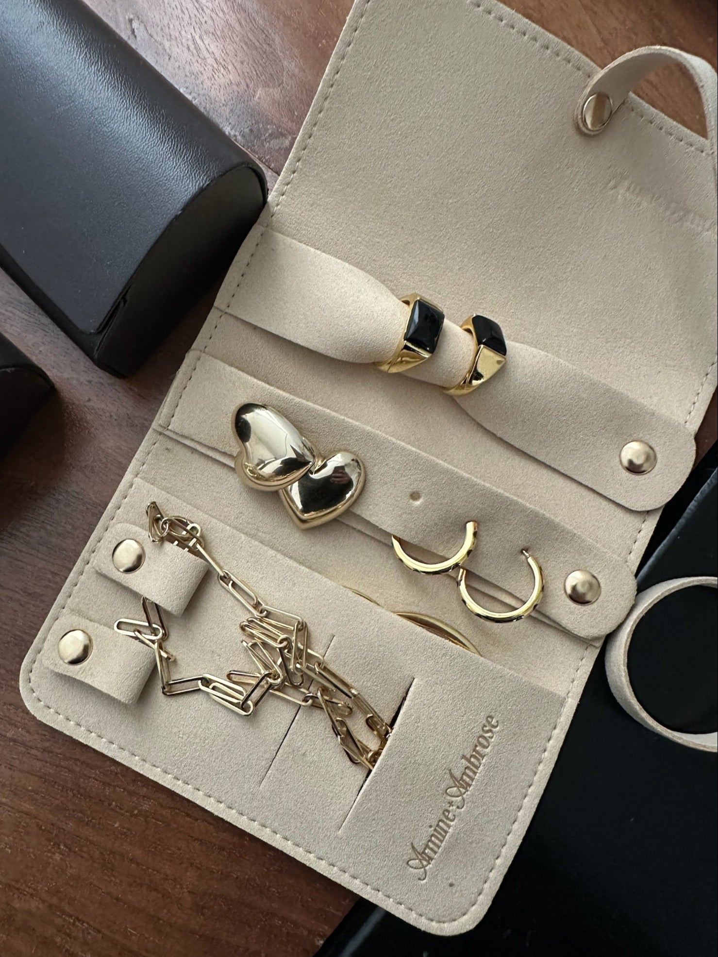 miniature suede-like jewelry roll designed for safe keeping of jewelry while traveling