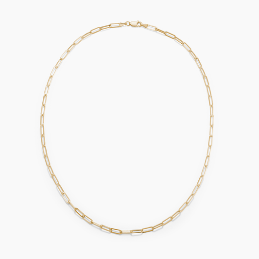 GOLD CHAIN NECKLACE ON A WHITE BACKGROUND